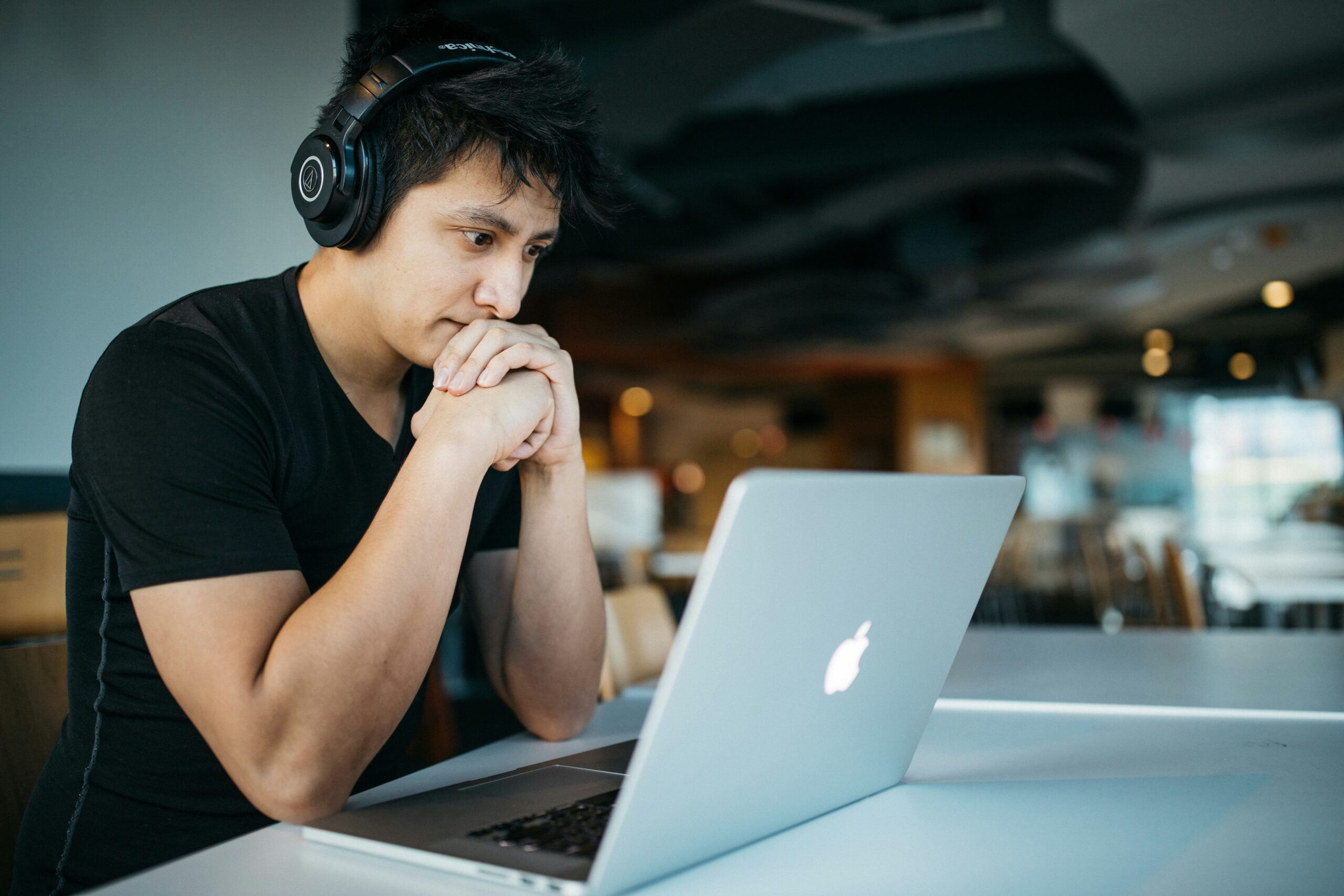 man working or studying at computer