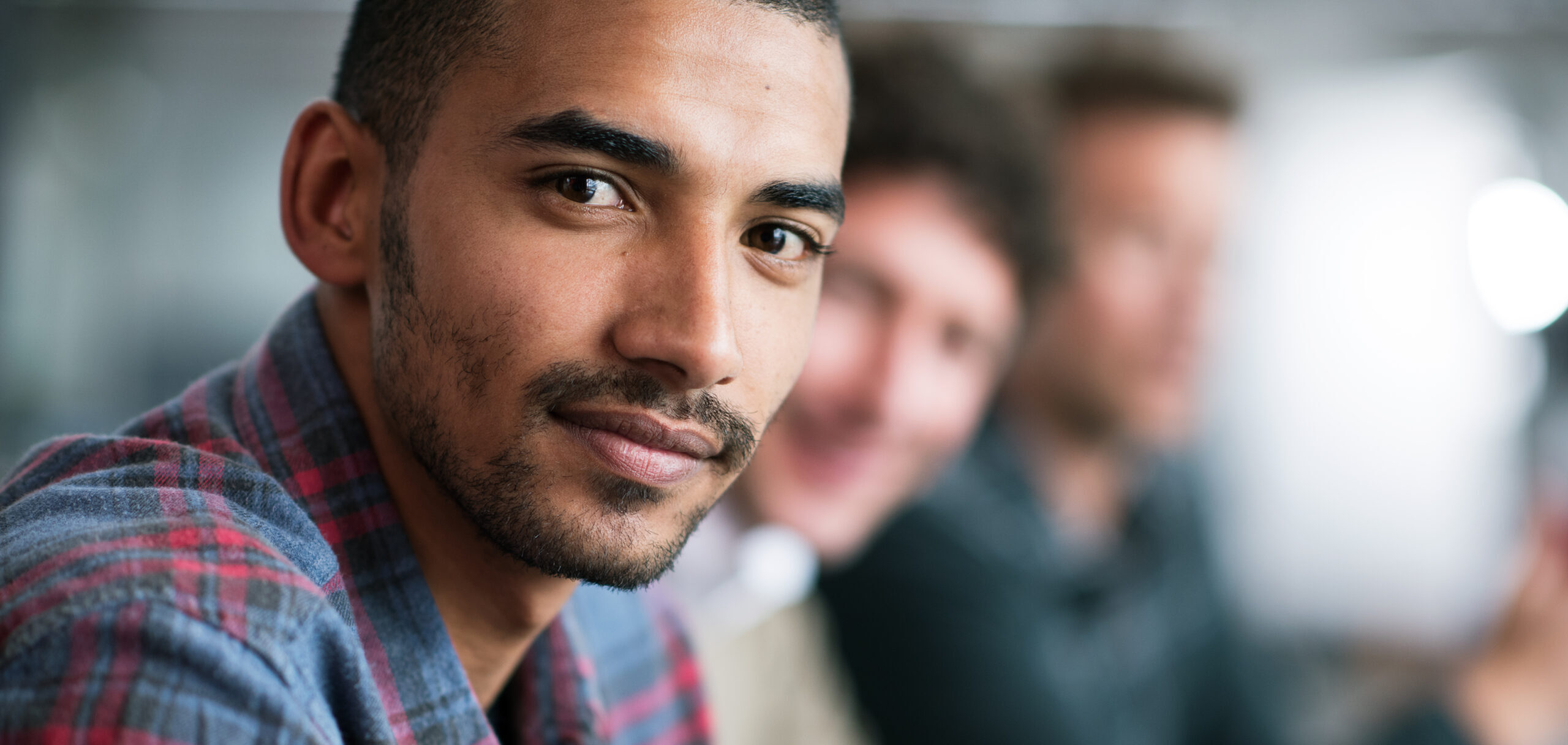 Man focusing into camera